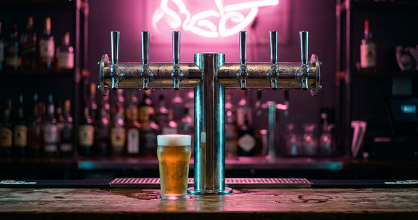 Draft beer taps on a bar back-counter