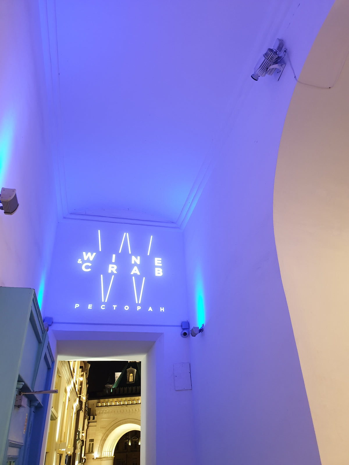 Brand logo projected onto a surface by a gobo projector