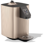 Champagne-colored ridged dispenser shown at an angle with drip tray, on a white background