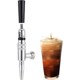 Beer faucet standing beside a glass of nitro cold brew coffee with a splash effect