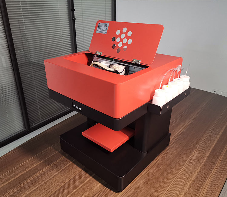 The printer with its lid raised, print head over the bed and CISS ink bottles on the side